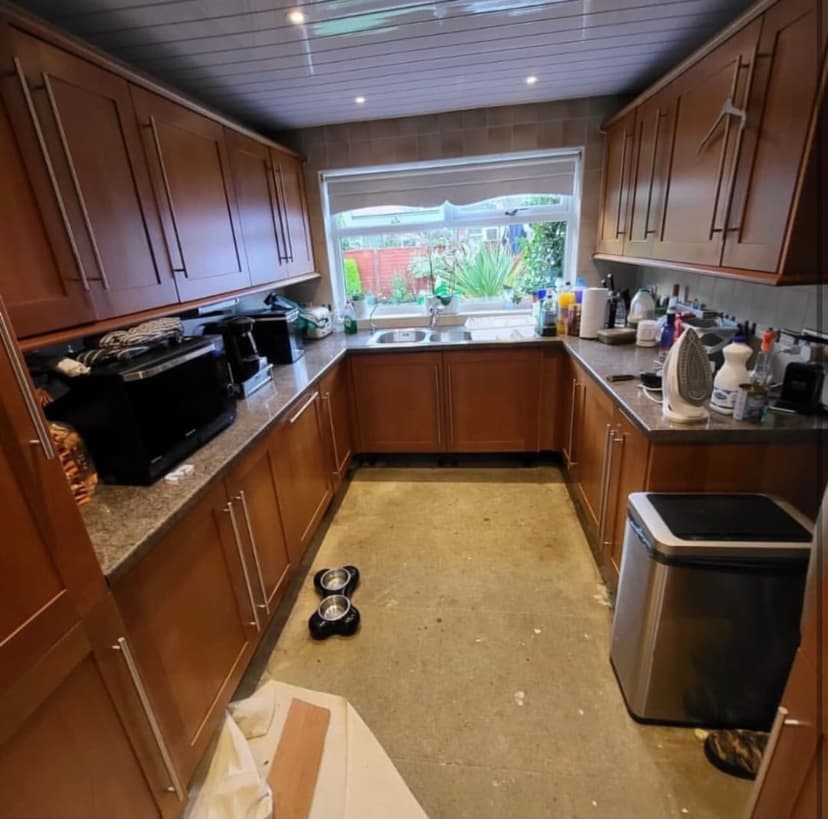 Kitchen before respray - dark oak cabinets close up
