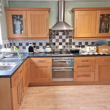 Kitchen before respray - natural oak cabinets