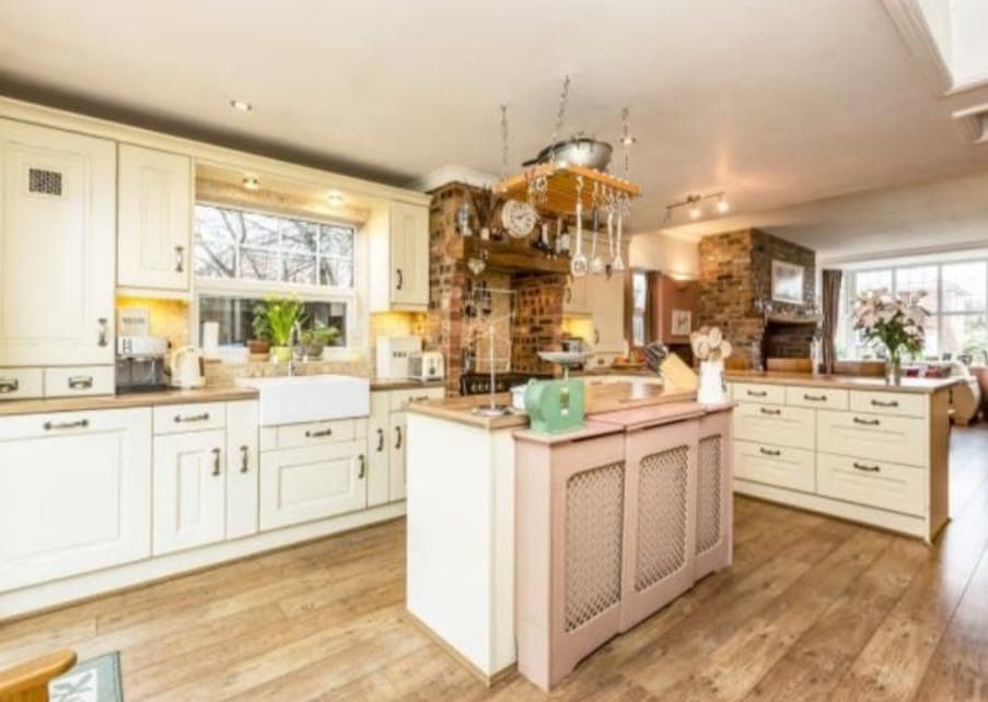 Kitchen after respray - country cream cabinets in Chorley