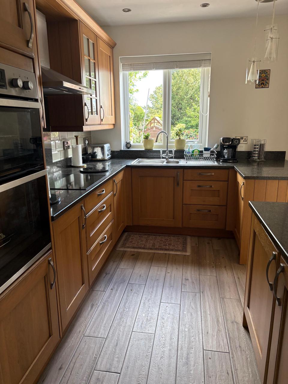 Before kitchen respray showing the original wooden kitchen doors